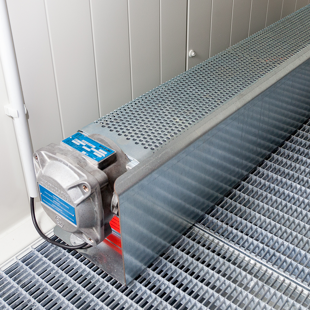Finned tube heating in a hazardous materials warehouse