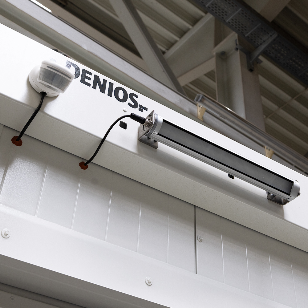 Control of outdoor lighting via a motion detector