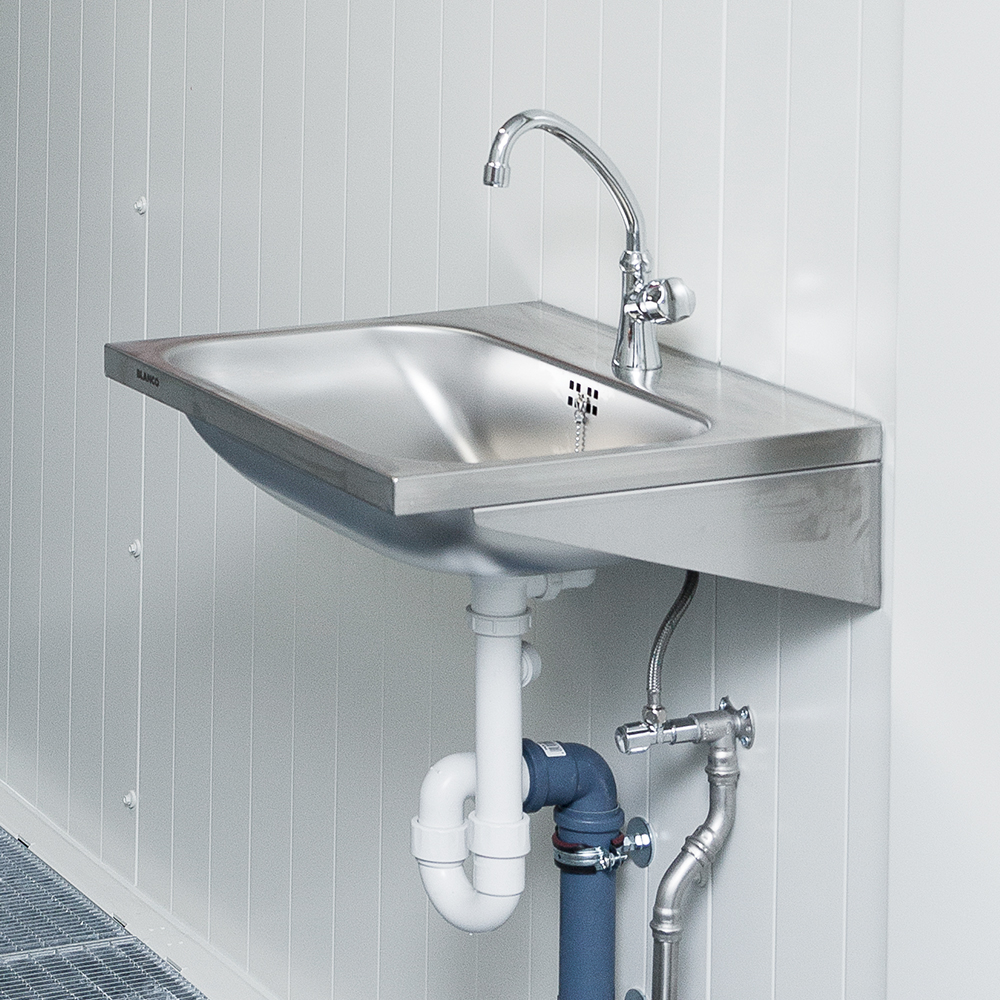 Washbasins in the walk-in hazardous materials warehouse of DENIOS